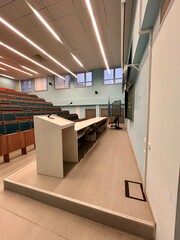 a tribune on a podium in a classroom
