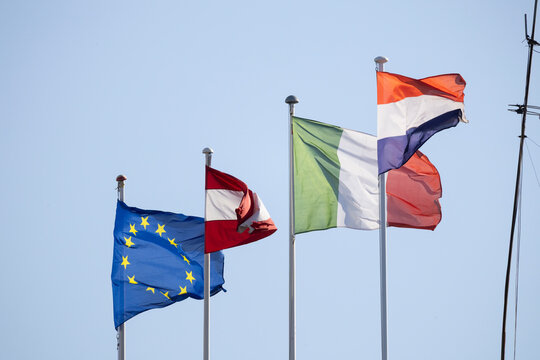 European union, austria, italy, netherlands flags waving in wind