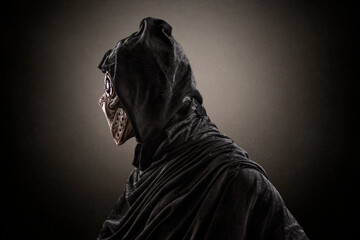 Robot android over dark misty background with clipping path