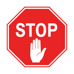 A classic red stop sign featuring a white hand symbol