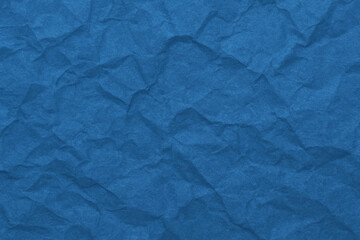 Obraz premium blue background with crumpled paper effect, empty space for text, new year, christmas, holiday, birthday, template, photo background, banner, advertising, layout