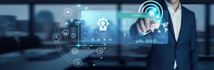 Consultant touching start button on modern interface to business target Management Consulting. Advising firms. Strategy, problem-solving, efficiency, business growth, performance improvement.