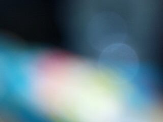 Obraz premium Cool-toned abstract background with soft bokeh circles and gentle blue gradients. Perfect for digital artwork, web design, marketing visuals, presentations, and modern graphic compositions.