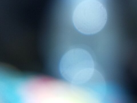 Cool-toned abstract background with soft bokeh circles and gentle blue gradients. Perfect for digital artwork, web design, marketing visuals, presentations, and modern graphic compositions.