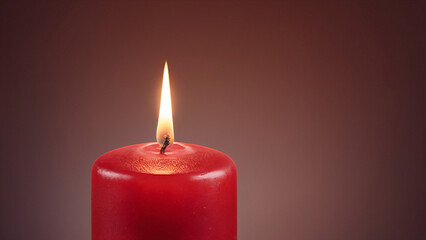 Red candle burning with soft warm light. Suitable for Christmas, prayer, memorial, romantic and holiday design