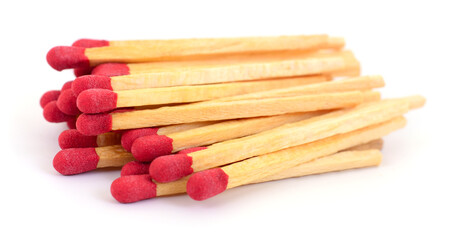 Wooden matches with red heads isolated on white background