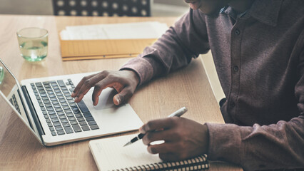 A businessman using computer in office