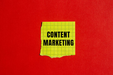 Content marketing message written on ripped torn paper background. Conceptual Content marketing symbol. Copy space.