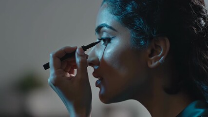 Woman applying eyeliner in different stages of makeup for beauty tutorial. Profile view of cosmetic use for eyes.