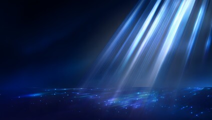 Abstract ethereal glowing light beams piercing through darkness creating a mystical atmospheric effect with shimmering particles on a deep blue background