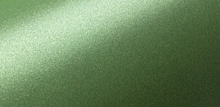 Deep forest green paper background with a smooth matte texture and subtle wavy edges. Rich basil and