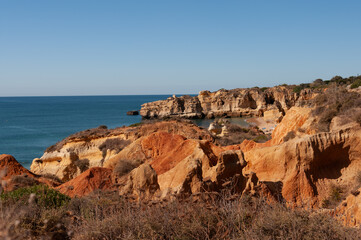 Algarve coastal cliffs with textured rock and ocean backdrop, perfect for travel themes, tourism promotion, environment studies and editorial projects.
