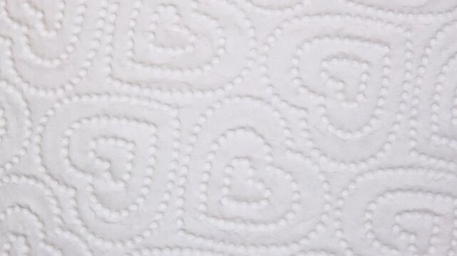 a decorative pattern on a paper towel product with hearts