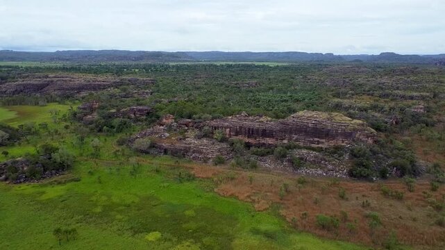 Ubirr Rock and it&acute;s surrounding vegetation in the Kakadu National Park on a cloudy day