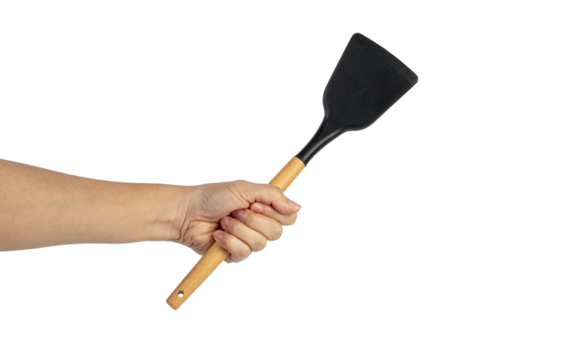 Hand with Black plastic kitchen spatula, kitchenware for cooking on transparent background.