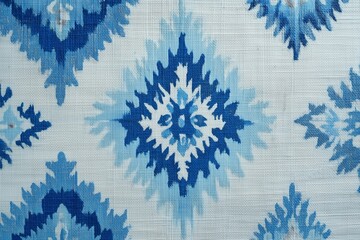 Cool-toned Ikat background with icy blue geometric motifs, crisp textile detailing and symmetrical design
