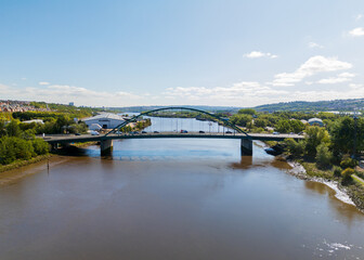 Newcastle upon Tyne UK: 15th Aug 2025: Drone view of Scotswood Bridge crosses the River Tyne in Newcastle with A1 and blaydon industrial estate