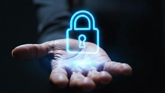 Man holding glowing blue padlock in palm. Holographic digital lock symbolizing cybersecurity. Technology protection concept for advertising and secure data innovation.