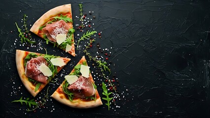 Delicious sliced pizza with meat and greens on a dark background overhead view