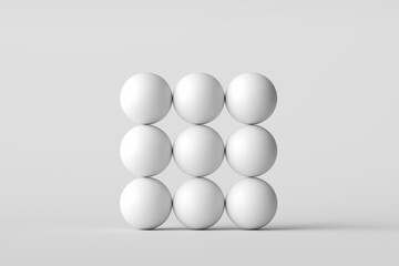 Nine white spheres forming a square on white background