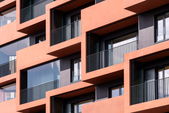 Housing volumes in HafenCity reveal modern architecture defined by a geometric facade and layered structure composition within Hamburg Germany guided by precise contemporary design intent