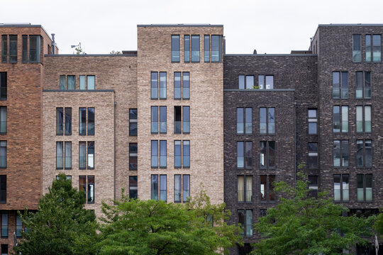 Modern residential architecture rises in HafenCity featuring a geometric facade and layered structure elements shaping housing identity throughout Hamburg Germany through contemporary design