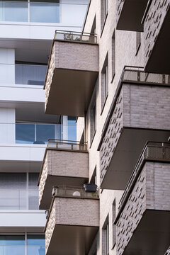 Modern housing architecture in HafenCity presenting a geometric facade and strong structure elements in Hamburg Germany with a clear emphasis on residential contemporary design