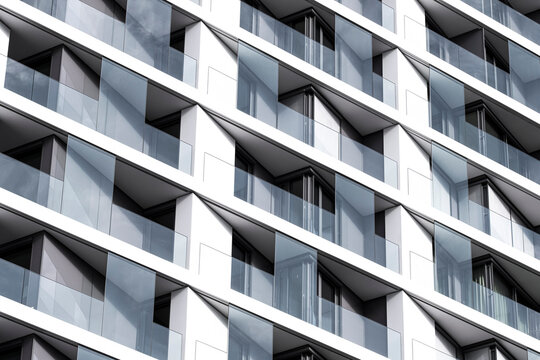 Geometric facade patterns define this modern residential architecture scene in HafenCity as strong structure details shape housing visuals across Hamburg Germany through contemporary design