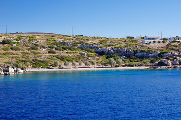 The beach near the port of Arki, Greece