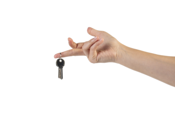 Key with a ring in hand on a transparent background.