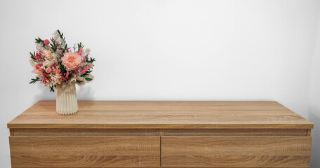 Elegant Dried Floral Bouquet in Vase on Modern Wooden Console