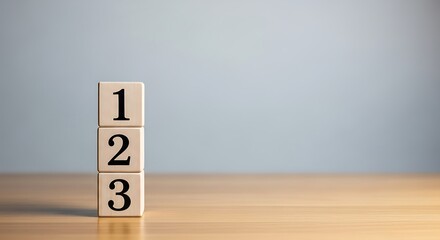 Three Numbered Wooden Blocks Stacked Vertically on a Desk, Illustrating a Step-by-Step Process or Sequential Order