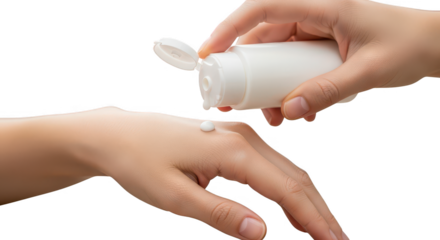 Hand applying white cream from a small bottle isolated on white background
