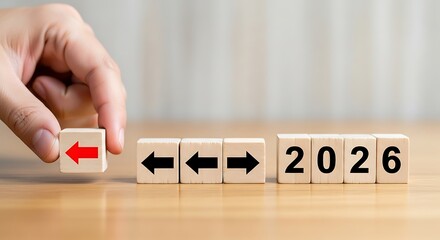 Preparing for the Year 2026 Hand Placing Block with Arrow, Forecasting Ahead