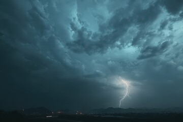 Moody thunderclouds over a gray horizon with generous writable space