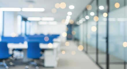 Abstract, blurred modern office interior with blue workstations and golden bokeh