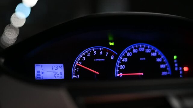 Four-cylinder car engine accelerating and decelerating, creating a loud, roaring engine revving sound.