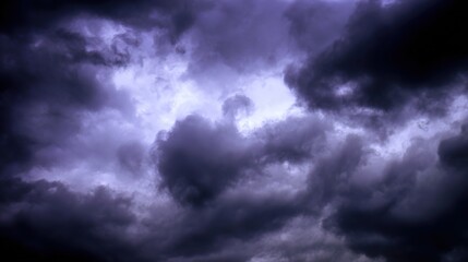 Obraz premium midgard. Dark purple storm clouds gathering before rainfall, dramatic sky formation, natural weather phenomenon. travel magazines, destination branding, designed for travel destination branding.