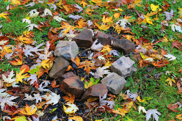 fire place on autumn meadow