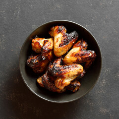 Grilled chicken wings in bowl