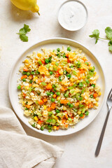 Cauliflower fried rice with carrot, green pea, corn, scrambled eggs