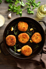 Fish cakes from mashed potato and minced cod fish
