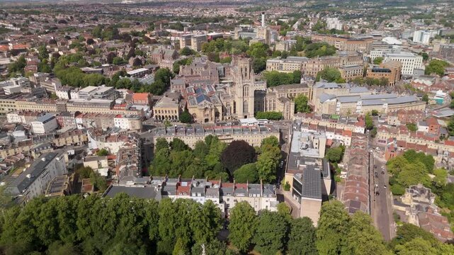 Bristol UK: 28th July 2025: Breathtaking drone view of Cabot Tower surrounded by lush greenery of Brandon Hill park. With University of Law in background