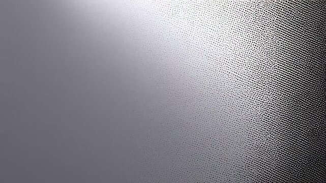 Abstract black and white gradient pattern with dotted texture.
