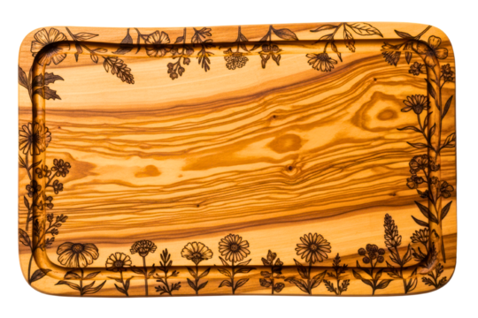 Rectangular olive wood serving board with engraved floral border isolated on transparent background
