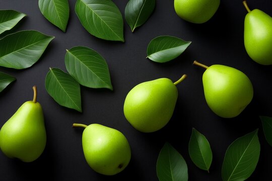 Flat lay pattern of ripe green pears and fresh leaves on a solid black background, showcasing vibrant colors and natural textures in a visually appealing arrangement