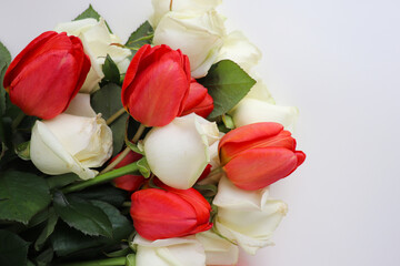 greeting card design. bouquet of tulips on a white background and space for text	