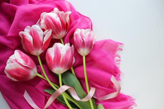 greeting card design. bouquet of tulips on a white background and space for text