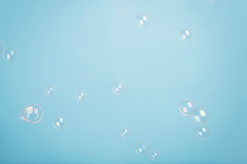 A blue background with soap bubbles