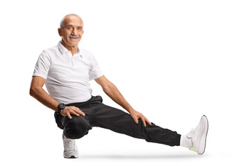 Obraz premium Mature man in sportswear stretching leg